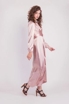 Feel more confident than ever before in the Satin Wrap Maxi Dress with Puff Sleeves that combines modesty with today’s most current modest fashion trends. The sleek satin maxi dress accentuates the waist with a luxurious wrap design while the puff sleeves accent a bold shoulder and feminine shape.Perfect for every special occasion, the unique dress comes in multiple colors to best fit your individual personality. Fitted Belted Maxi Dress For Brunch, Long Sleeve Maxi Dress With Side Slits, Pink Belted Midi Dress For Party, Floor-length Belted Party Dress, Belted Floor-length Party Dress, Spring Belted Floor-length Maxi Dress, Elegant Pink Belted Maxi Dress, Chic Pink Belted Maxi Dress, Formal Maxi Dress With Belt