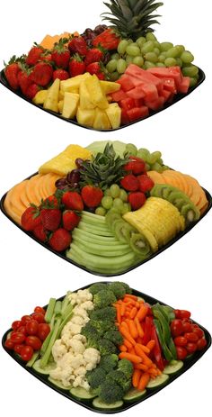 a heart shaped platter filled with lots of fruit and veggies on top of each other