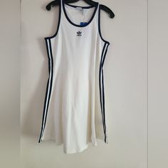 Adidas Tank Dress A-Line Off White Sz M Bnwt Adidas Sporty Sleeveless Dress, Sporty Adidas Cotton Dress, White Sleeveless Mini Dress Casual Style, Casual White A-line Dresses, Sporty Knee-length Summer Dress, Sporty Cotton Mini Dress, White Sleeveless Cotton Mini Dress, White Fitted Athletic Dress, White Cotton A-line Mini Dress