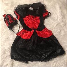 Queen Of Hearts Costume With Wig. Includes Very Cute Queen Of Hearts Black And Red Dress. Ruffled Sleeves And A Tutu Style For The Bottom Of The Dress. Also Includes Headpiece. Brand New Never Been Used. Dress Is A Size Small/Medium. Would Fit Ages 6-8 Best. M Costumes, Costume With Wig, Cute Queen, Tutu Style, Black And Red Dress, Heart Costume, Queen Of Hearts Costume, Matching Costumes, Queen Costume