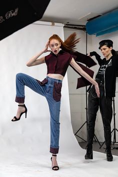 two models are posing in front of a camera