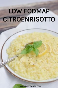 a bowl filled with lemon risotto on top of a table