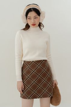 Faux wool tweed mini skirt in a bold diamond check pattern. Concealed back zipper. Lined with safety shorts. S: 25" waist, 33" hips, 16" lengthM: 26.5" waist, 34.5" hips, 16" lengthL: 28" waist, 36" hips, 16" lengthXL: 29.5" waist, 37.5" hips, 16" length Safety Shorts, Tweed Mini Skirt, Plaid Mini Skirt, Shoe Gifts, Overall Dress, Sweater Blouse, Check Pattern, Cardigan Jacket, Jeans Pants