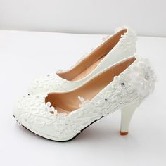 Details: Heel Height: 8 cm Color: White Upper Material: PU Outsole Material: Rubber Toe: Round Toe Embellishment: Lace; Beading Occasion: Wedding Closed Toe Wedding Shoes With 4-inch Heel For Banquet, Embellished High Heel Wedding Shoes For Banquets, Embellished High Heel Wedding Shoes For Banquet, White Rhinestone Heels For Banquet, White Low Heel Wedding Shoes For Banquet, White Closed Toe Wedding Shoes For Banquet, White Closed-toe Wedding Shoes For Banquet, White Closed Toe Heels For Banquet, Embellished High Heel Wedding Shoes