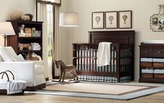 a baby's room with furniture and decor