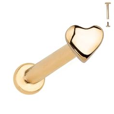 a gold door handle with a heart shaped knob on the front and back of it