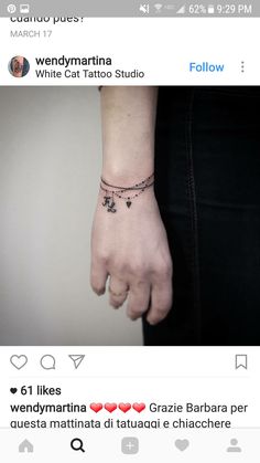 a person with a small tattoo on their wrist