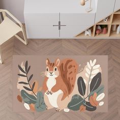 a rug with an image of a squirrel and leaves on the floor next to a chair