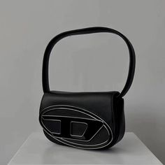 Color: Black Black Leather Shoulder Bag For Streetwear, Black Leather Streetwear Shoulder Bag, Trendy Black Shoulder Bag For Streetwear, Trendy Black Bucket Shoulder Bag, Trendy Black Bags For Streetwear, Trendy Black Streetwear Bags, Black Leather Bag For Streetwear, Black Shoulder Bag For Streetwear, Modern Black Shoulder Bag For Streetwear