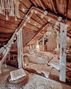 an attic bedroom is decorated in rustic style