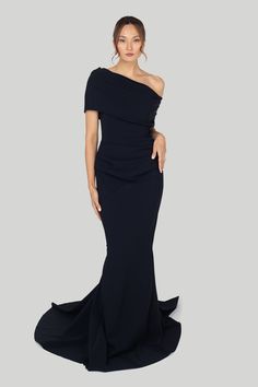 As seen on Meghan Markle - the Duchess of Sussex. Look your best with Greta Constantine's Ospeh Gown. This stunning black tie appropriate gown is perfect for weddings, galas, and other formal events that require you to dress at your best. The gown is tailored to flatter your shape, ensuring you will look and feel your best. True to size 68% polyamide | 32% elastane Body Made in Toronto | Fabric milled in Italy Dry Clean *Note that Special Order pieces take 22 - 26 weeks to ship. Greta Constantine, Simple Tees, The Duchess, Military Inspired, Look Your Best, Meghan Markle, Sleeve Detail, Apparel Design, Elegant Dress