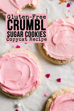 cookies with pink frosting and sprinkles on top