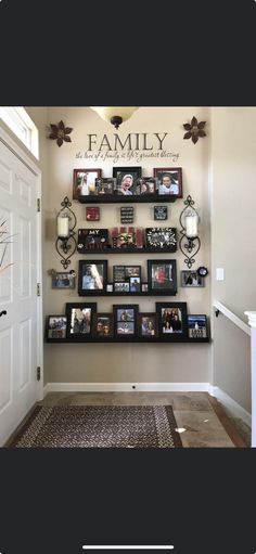 the family wall is filled with pictures and frames