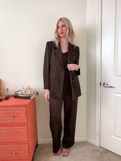 Beautifully made 90's chocolate brown satin suit set.  This set purchased from the private collection of an Italian fashion model in Florence, Italy. The fabric drapes beautifully, and is a rich warm brown.  This is being sold only as a full set, cannot be purchased as individual pieces.  Suit would fit a modern size Small/Medium depending on desired fit. Please check measurements below. If you have any concerns on sizing, please message me! Garment Measurements: Jacket Bust: 39in / 99cm Arm Length: 24in / 61cm Lenth: 29in / 74cm Top Bust: 38in / 96.5cm Waist: 34.5in / 88cm Lenth: 23in / 58.5cm Pant Waist: 31in / 79cm Hip: 37in / 94cm Inseam: 32in / 81cm Model Measurements: Bust: 32 in / 81cm Waist: 27 in / 68.5cm Hip: 38 in / 96.5cm Height: 5'10 / 178cm Due to vintage nature, items will h Satin Suit Outfit, Satin Pant Suit, Linen Suits Women, Chocolate Satin, Black Uniform, Satin Pant, Satin Suit, Blazer Top, Womens Dress Suits