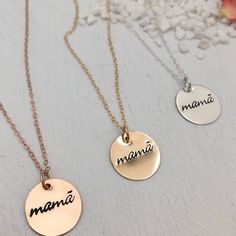 A minimalist lover's modern token of motherhood. A beautiful piece to celebrate your mama status. Mamã with the accent on the a is an ode to the designers Portuguese heritage. We love this piece to layer with other necklaces. Pendant measures 5/8 inch. Available in sterling silver, 14kt gold or rose gold fill made to last and be worn everyday. Fancy Font. This piece is ready to ship and usually leaves our studio in 1 to 3 business days. BACK TO MY SHOP: https://www.etsy.com/shop/IsabelleGraceJew Hand Stamped Sterling Silver Necklace In Rose Gold, Rose Gold Hand Stamped Sterling Silver Necklace, Rose Gold Sterling Silver Hand Stamped Necklace, Rose Gold Sterling Silver Necklace With Hand Stamped Details, Nickel-free Necklace For Mother's Day Personalized Gift, Rose Gold Round Necklace Gift For Mom, Adjustable Hand Stamped Necklace, Rose Gold Necklace For Mom, Rose Gold Round Necklace For Mom