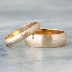 Hammered by hand in our Vermont jewelry studio, this band delivers everything that is timeless and classic about a simple hammered wedding band--in stunning white gold. Band and Width: A half-round 2mm, or 5mm wide band. Measuring approximately 1.55mm off the finger.Metal: Shown here in 14k yellow gold Sourcing note: We use 100% ethical, recycled, metals refined in the USA. Any of our designs can also be made in hypoallergenic, nickel-free metals. ****Please be aware each ring is crafted to orde