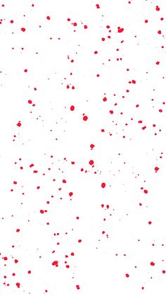 red sprinkles are scattered on a white background