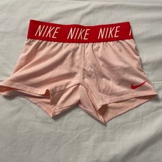 Pink Nike Shorts Extra Small Excellent Condition, Never Worn A Little See Thru Nike Sportswear Bottoms For Summer, Logo Waistband Summer Shorts, Spring Bottoms With Logo Waistband, Nike Pink Bottoms For Loungewear, Nike Pink Loungewear Bottoms, Nike Pink Short Leg Bottoms, Casual Summer Bottoms With Logo Waistband, Fitted Summer Bottoms With Logo Waistband, Fitted Bottoms With Logo Waistband For Summer