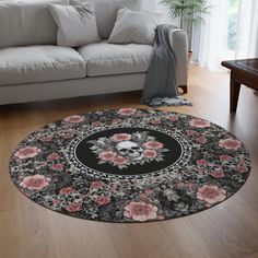 a living room with a couch and rug on the floor