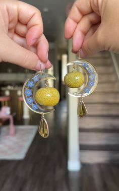 Preserved forget me not moons with preserved craspedia balls in resin and yellow glass suncatchers on 14k gold filled earring hooks. NYFW 2024 collection. Nyfw 2024, Glass Suncatchers, Gold Filled Earrings, Earring Hooks, Forget Me Not, 2024 Collection, Free Jewelry, Jewelry Bags, Suncatchers