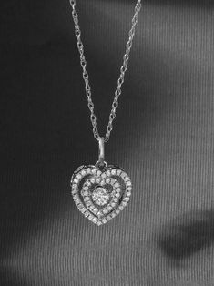 Crafted in white gold, this necklace features a duos of diamond-lined heart-shaped frame centered with a diamond in a unique setting that showcases the movement of the diamond. It suspends on an 18-inch rope chain that secures with a spring ring clasp.Product Care : Wipe CleanMaterial : 100% Gold Heart Shaped Frame, Bootie Sandals, Straw Bags, Baby Boy Shoes, June 1, Small Accessories, Tie And Pocket Square, Toddler Girl Outfits