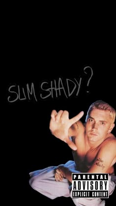 a man doing a hand stand in front of a black background with the words slim shady written on it