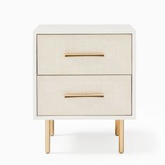 a white and gold nightstand with two drawers on one side, against a white background