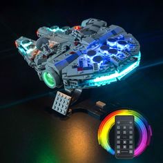 a lego light up kit is shown with remotes and the lights are glowing brightly