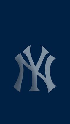 the new york yankees logo on a dark blue background