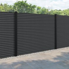 a brown fence with black slats on it