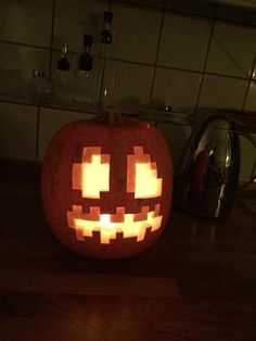 a pumpkin that has been carved to look like an evil face