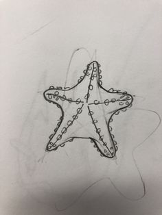 a drawing of a starfish on white paper