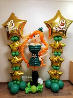 an image of a woman with balloons in the shape of stars and balloon archs