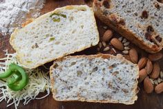 some bread and nuts on a wooden table