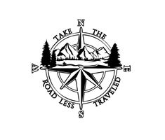 a compass with trees and mountains in the background, that says take n the road less traveled