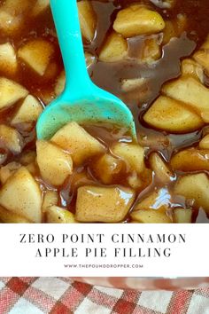 a close up of a spoon in some food with text overlay that reads zero point cinnamon apple pie filling