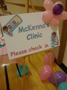 there is a sign that says mckenna's clinic please check in on it