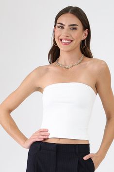 White tube top White Fitted Chic Crop Top, Elegant Stretch Tube Top For Day Out, Elegant Tube Top For Day Out, Chic Strapless Tank Top For Day Out, Chic Solid Color Bandeau Top, Elegant Bandeau Tank Top For Spring, Fitted Bandeau Tank Top For Day Out, White Tube Top For Night Out, Chic White Stretch Tube Top