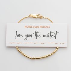 Our "Love You the Mostest"  Morse Code Bracelet features 14k gold filled or sterling silver beads encoded with a hidden message known only to you and those you share it with. This unique design makes for a perfect best friend, sister, or girlfriend gift with each dainty bead and dash carrying a secret reminder of your special bond. As they wear the bracelet, they carry the message close to them, serving as a reminder of your love.  * listing is for ONE morse code bracelet  D E T A I L S * 100% 1 Meaningful Gold Beaded Bracelets For Gifts, Meaningful Gold Beaded Bracelet For Gifts, Meaningful Gold Beaded Bracelets As Gift, Meaningful Gold Beaded Bracelet As Gift, Dainty Gold Beaded Bracelets For Anniversary, Gold Dainty Beaded Bracelets For Anniversary, Dainty Gold Bracelet For Wedding And Mother's Day, Gold Beaded Bracelets For Valentine's Day Anniversary, Meaningful Gold Bracelets For Mother's Day