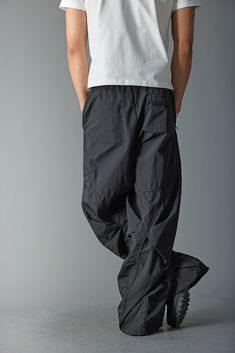 The Deconstructed Pleated Zipper Pockets Pants combine avant-garde style with impeccable craftsmanship, offering a standout piece for any fashion-forward wardrobe. These pants feature an irregular, deconstructed design with pleated stacking that adds depth and dimension. The front showcases zipper accents at the knees, along with zippered pockets on both sides for a touch of functionality and edge. Crafted from premium fabric, these slightly oversized pants provide both comfort and a modern silh Oversized Pants, Sneakers And Socks, Pockets Pants, Avant Garde Fashion, Jean Accessories, Pocket Pants, Short Pants, Zipper Pocket, Hoodie Shirt