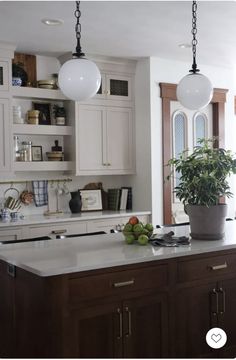 Warm Kitchen Ideas, Neutral Cabinets, Warm Kitchen, Brown Cabinets, Medium Brown, Globe Lights