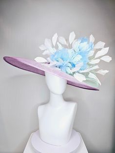 From the 2024 Featured Milliner of the Kentucky Derby Museum  kentucky derby hat large wide brim sinamay purple lavender hat with baby blue feather flowers, white ivory feathers and mint green crinoline adjustable inseam standard approx 23 inches  I can probably add feathers, flowers etc to existing hats for a small fee. I cannot remove anything from existing hats. Just message me and see if we can make it work! :) I cannot make custom order from scratch. My schedule is unfortunately too crazy : Lavender Hat, Feather Flowers, Elegant Hats, Kentucky Derby Hat, Feather Flower, Derby Hat, Blue Feather, Flowers White, Purple Lavender