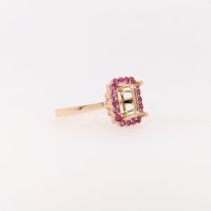 Discover a timeless classic with our Pink Sapphire Ring Semi Mount in Solid 14k Gold! This elegant emerald cut gemstone will make a stunning statement piece that will last for generations. With meticulous milgrain detail, this exquisite ring is the perfect way to show your love forever. Timeless Emerald-cut Ruby Ring, Yellow Gold Octagon Ring With Halo Setting, 14k Gold Emerald-cut Birthstone Ring With Diamond Cut, 14k Gold Emerald Cut Diamond Birthstone Ring, 14k Gold Birthstone Ring With Emerald Cut Diamond, 14k Gold Emerald Ring With Octagon Prong Setting, 14k Gold Octagon Emerald Ring With Prong Setting, Octagon Emerald Ring In 14k Gold With Prong Setting, Timeless 14k Gold Ruby Ring With Prong Setting