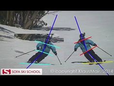 two people on skis in the snow with poles attached to their backs and arms