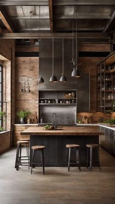 an industrial style kitchen with two stools in front of the island and wooden counter tops