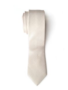 "Light tan/khaki silk & linen blend necktie. Pale ecru woven \"Davison\" tie. These come in one perfect \"Goldilocks\" middle tie size: our narrow, modern slim cut. Not too skinny, not too wide. Just right! In a woven shot pattern, the alternating silk and linen threads in the warp and weft of the fabric are each very light and a bit darker, when seen together make an extraordinarily unique solid fabric when seen at a distance. Neckties are $48 each; add a coordinating pocket square for just Beige Standard Tie For Business, Cream Standard Tie For Wedding, Beige Suit And Tie Accessories For Black Tie Event, Silk Linen, Pocket Squares, Mens Neck Ties, Light Tan, Pocket Square, Necktie