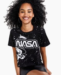 Take your casual style out of this world in this Love Tribe juniors' T-shirt with an astronaut Nasa motif. Black Crew Neck Grunge Top, Black Grunge Crew Neck Top, Basic Crew Neck Top With Front Print, Urban Crew Neck Top Pre-shrunk, Urban Crew Neck Pre-shrunk Top, Urban Pre-shrunk Crew Neck Top, Black Graphic Tee For Streetwear, Black Relaxed Fit Screen Print Top, Black Crew Neck Top With Front Print