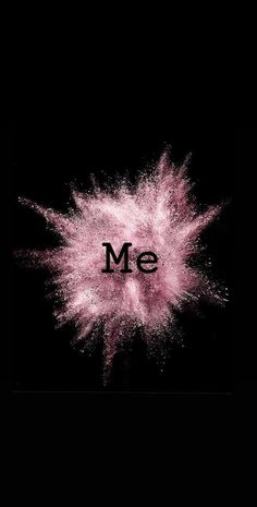 the word me is written in black and pink ink on a black background with white spray