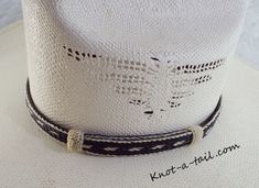 this horsehair hat band is a Bolder hat band done in black and white horsehair. 100% all natural horsehair. Everything you have been looking for in a Horsehair hat band. Distinctive look, uncompromising quality, and a unique design. * This is a 5 strand horsehair hat and that is about 5/8 inches wide.. You will find it easy to adjust to fit most any size hat with the two sliding knots. Brings out your spirit in an exclusive design that is vibrant as your western lifestyle. MEASUREMENTS * Longest White Adjustable Hat With Flat Crown, White Adjustable Flat Crown Hat, Adjustable Black Hat Bands For Western-themed Events, Black Adjustable Hat Band For Western-themed Events, Adjustable Black Hat Band For Rodeo, Bohemian Black Hat Bands For Ranch, Custom Handmade Black Hat Bands, White Flat Crown Hat Bands For Beach, Southwestern Black Hat Bands For Country Events