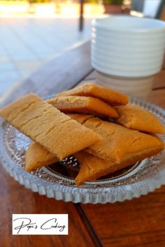 some food is sitting on a glass plate